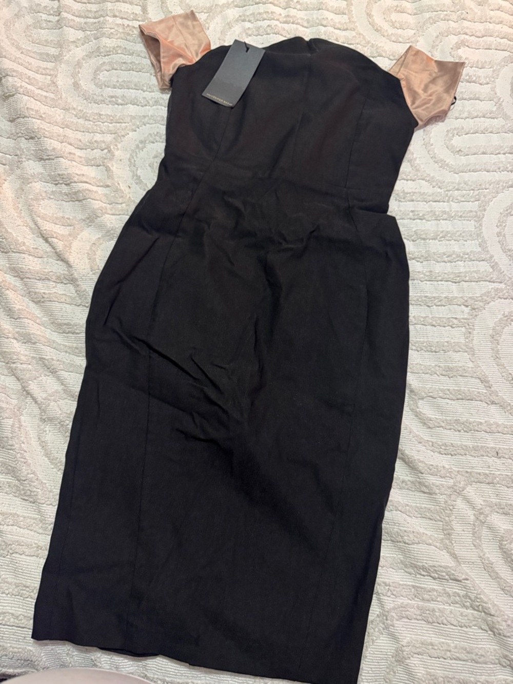Elegant Black Pencil Dress with Blush Sleeve Accents